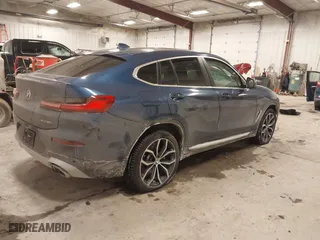 2023 BMW X4 xDrive30i with VIN 5UX33DT01P9R31277, listed as a IAAI auction lot 41618617 with 23,952 mi miles. Bid and sale history available at carsss.com. Image 4.
