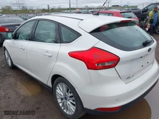 2015 Ford Focus Titanium with VIN 1FADP3N23FL293432, listed as a IAAI auction lot 41929774 with 100,865 mi miles. Bid and sale history available at carsss.com. Image 3.