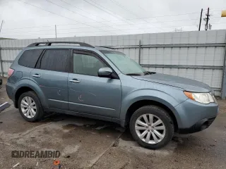 2012 Subaru Forester X Premium with VIN JF2SHADC7CH400060, listed as a Copart auction lot 59398835 with 131,826 mi miles and Salvage title. Bid and sale history available at DreamBid. Image 4.