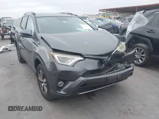 2018 Toyota RAV4 XLE z VIN 2T3WFREV1JW512476, wystawiony jako IAAI lot #42177733 z przebiegiem 132 207 mil mil oraz . Historia ofert i sprzedaży dostępna na DreamBid. Obrazek 1.