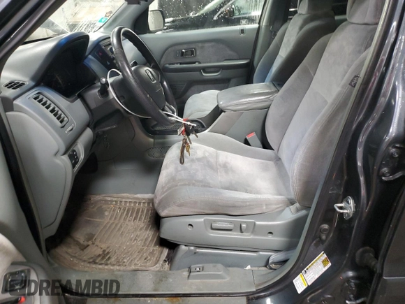 2005 Honda Pilot EX with VIN 5FNYF18445B023353, listed as a Copart auction lot 52409725 with 151,078 mi miles and Salvage Title. Bid and sale history available at DreamBid. Image 7.