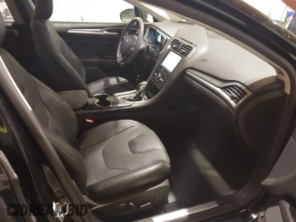 2016 Ford Fusion Titanium with VIN 3FA6P0K96GR197709, listed as a IAAI auction lot 40977902 with 135,259 mi miles. Bid and sale history available at carsss.com. Image 5.
