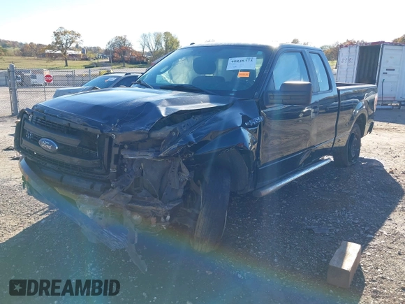 2014 Ford F-150 XL with VIN 1FTFX1CF0EFD04042, listed as a IAAI auction lot 40848373 with 164,631 mi miles. Bid and sale history available at carsss.com. Image 2.