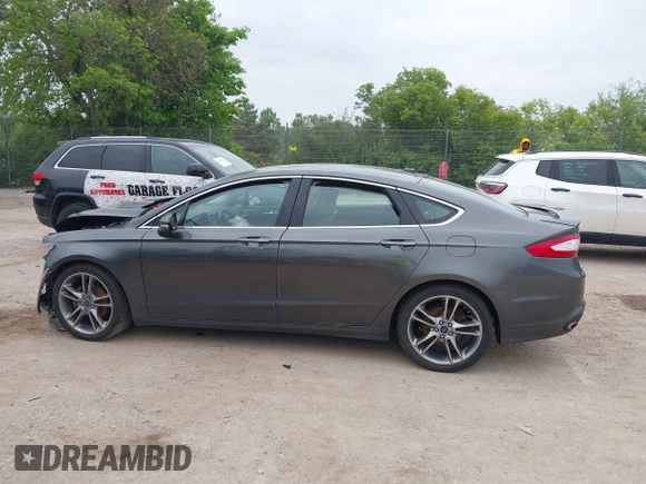 2016 Ford Fusion Titanium with VIN 3FA6P0D97GR133823, listed as a IAAI auction lot 42429708 with 166,105 mi miles and . Bid and sale history available at DreamBid. Image 14.
