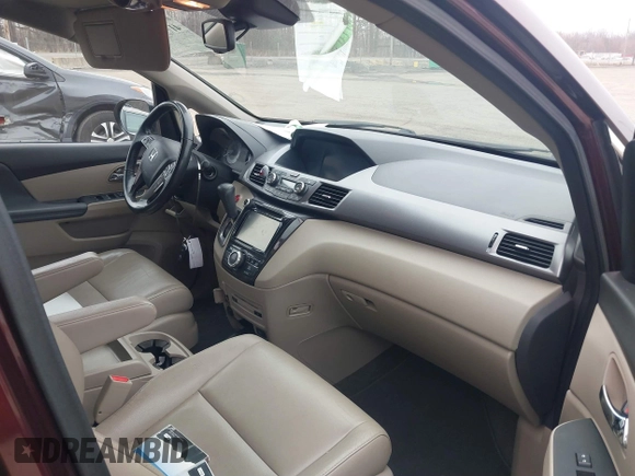 2014 Honda Odyssey Touring with VIN 5FNRL5H97EB117971, listed as a IAAI auction lot 41794324 with 198,191 mi miles and . Bid and sale history available at DreamBid. Image 5.