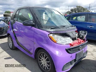 2013 Smart fortwo Pure with VIN WMEEJ3BA0DK686417, listed as a IAAI auction lot 41803956 with 83,850 mi miles. Bid and sale history available at carsss.com. Image 1.