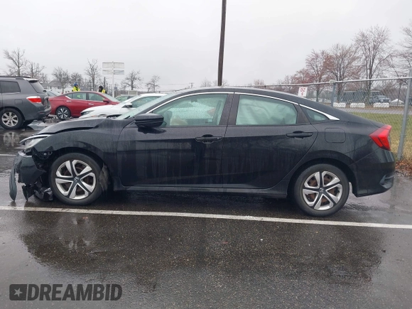 2018 Honda Civic LX with VIN 2HGFC2F54JH548274, listed as a IAAI auction lot 41864457 with 60,905 mi miles and . Bid and sale history available at DreamBid. Image 14.