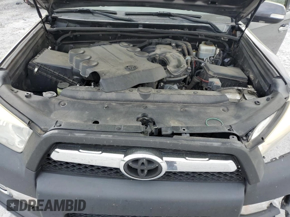 2012 Toyota 4Runner SR5 z VIN JTEZU5JR9C5043602, wystawiony jako Copart lot #51217145 z przebiegiem 233 927 mil mil oraz Szkoda całkowita • Salvage title. Historia ofert i sprzedaży dostępna na DreamBid. Obrazek 13.