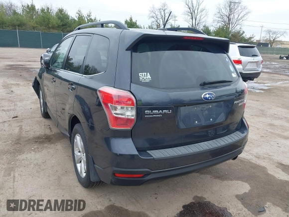 2014 Subaru Forester 2.5i Limited with VIN JF2SJAJC1EH517094, listed as a IAAI auction lot 41953103 with 145,122 mi miles. Bid and sale history available at carsss.com. Image 3.