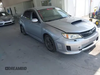 2013 Subaru Impreza Sedan WRX WRX with VIN JF1GV7E60DG014909, listed as a IAAI auction lot 42127645 with 70,360 mi miles. Bid and sale history available at carsss.com. Image 1.