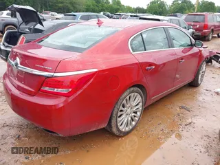 2014 Buick LaCrosse Premium II with VIN 1G4GF5G3XEF273604, listed as a IAAI auction lot 42252108 with 154,257 mi miles and . Bid and sale history available at DreamBid. Image 4.