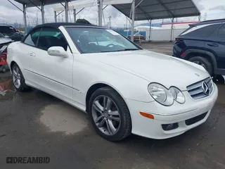 2009 Mercedes-Benz CLK-Class 3.5L with VIN WDBTK56F49F264895, listed as a IAAI auction lot 41781456 with 136,767 mi miles. Bid and sale history available at carsss.com. Image 1.