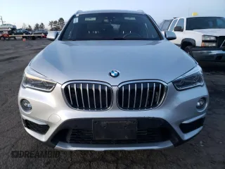 2017 BMW X1 xDrive28i with VIN WBXHT3C37H5F79624, listed as a Copart auction lot 71048542 with 48,425 mi miles. Bid and sale history available at carsss.com. Image 5.