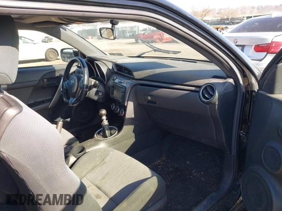 2014 Scion tC with VIN JTKJF5C78E3074094, listed as a IAAI auction lot 41828785 with 164,976 mi miles. Bid and sale history available at carsss.com. Image 5.