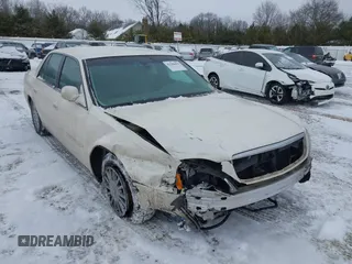 2003 Cadillac DeVille DHS z VIN 1G6KE57Y83U195252, wystawiony jako IAAI lot #41588455 z przebiegiem Nie podano mil oraz . Historia ofert i sprzedaży dostępna na DreamBid. Obrazek 1.