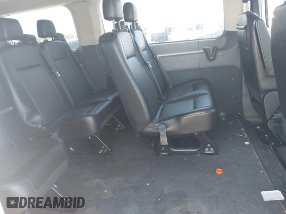 2021 Ford Transit Passenger XL with VIN 1FBAX2Y84MKA98230, listed as a IAAI auction lot 42570233 with 19,531 mi miles and . Bid and sale history available at DreamBid. Image 8.