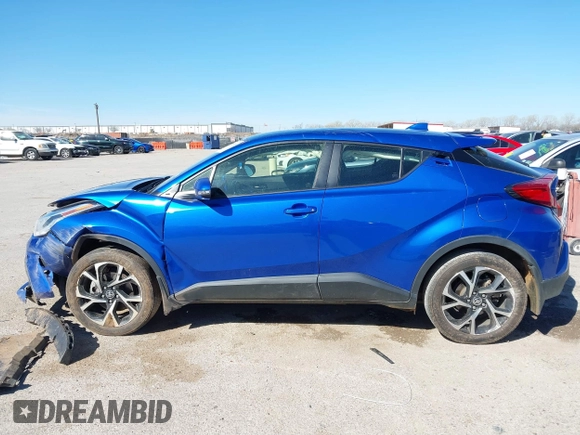 2021 Toyota C-HR LE with VIN JTNKHMBX0M1118192, listed as a IAAI auction lot 41805188 with 67,101 mi miles and . Bid and sale history available at DreamBid. Image 14.