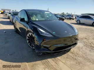2022 Tesla Model Y Performance with VIN 7SAYGDEF5NF337004, listed as a Copart auction lot 85801004 with 24,945 mi miles and Salvage Title. Bid and sale history available at carsss.com. Image 10.