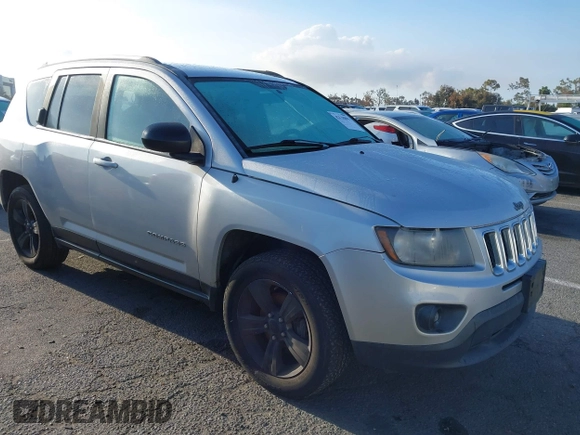 2014 Jeep Compass Sport with VIN 1C4NJDBB4ED567515, listed as a IAAI auction lot 42138801 with 183,673 mi miles. Bid and sale history available at carsss.com. Image 1.