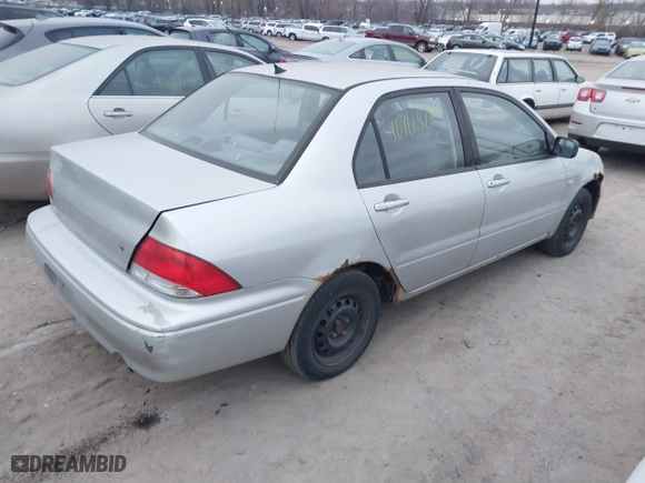 2002 Mitsubishi Lancer ES with VIN JA3AJ26E62U060214, listed as a IAAI auction lot 40961872 with 150,399 mi miles. Bid and sale history available at carsss.com. Image 4.