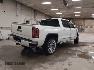 2017 GMC Sierra 1500 Denali with VIN 3GTU2PEJ7HG238165, listed as a IAAI auction lot 41727358 with Not Provided miles and . Bid and sale history available at DreamBid. Image 4.