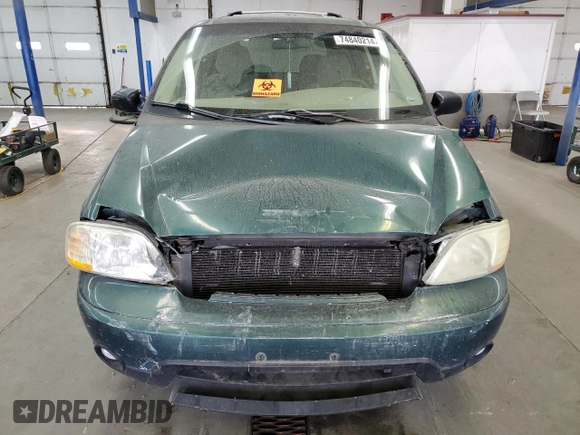 2002 Ford Windstar Sport Standard z VIN 2FMZA57452BB86707, wystawiony jako Copart lot #74840214 z przebiegiem 196 451 mil mil oraz Szkody całkowita. Historia ofert i sprzedaży dostępna na DreamBid. Obrazek 13.