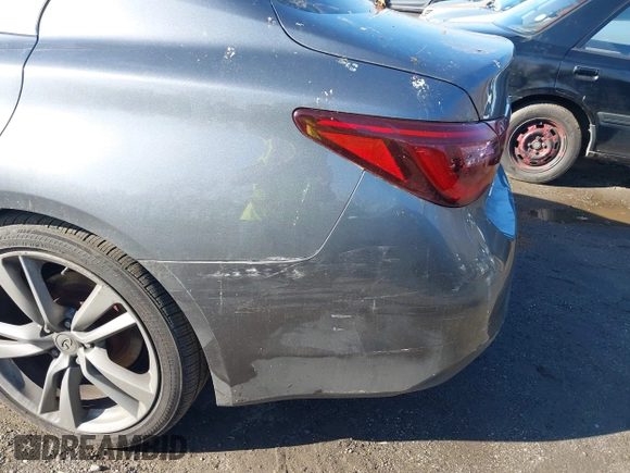 2019 Infiniti Q50 Luxe z VIN JN1EV7AR2KM590794, wystawiony jako IAAI lot #40841640 z przebiegiem 68 720 mil mil oraz . Historia ofert i sprzedaży dostępna na DreamBid. Obrazek 6.