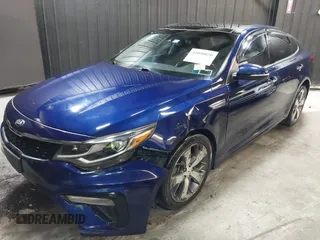 2019 Kia Optima LX z VIN 5XXGT4L37KG315026, wystawiony jako IAAI lot #42050820 z przebiegiem 148 579 mil mil oraz . Historia ofert i sprzedaży dostępna na DreamBid. Obrazek 2.