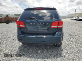2013 Dodge Journey SE z VIN 3C4PDCAB5DT686890, wystawiony jako Copart lot #58940995 z przebiegiem 148 382 mil mil oraz Czysty tytuł • Clean title. Historia ofert i sprzedaży dostępna na DreamBid. Obrazek 6.