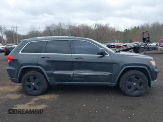 2011 Jeep Grand Cherokee Laredo with VIN 1J4RR4GGXBC597743, listed as a IAAI auction lot 41897286 with 253,111 mi miles and . Bid and sale history available at DreamBid. Image 13.
