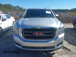 2019 GMC Yukon XL SLT with VIN 1GKS1GKC6KR244728, listed as a IAAI auction lot 41420847 with 138,527 mi miles. Bid and sale history available at carsss.com. Image 12.