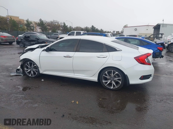 2020 Honda Civic Sedan Touring with VIN 19XFC1F91LE210390, listed as a IAAI auction lot 41766652 with 67,269 mi miles. Bid and sale history available at carsss.com. Image 14.