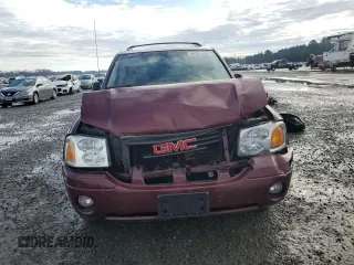 2003 GMC Envoy SLT with VIN 1GKDT13S032245485, listed as a Copart auction lot 84385304 with 139,183 mi miles and Salvage Title. Bid and sale history available at carsss.com. Image 5.