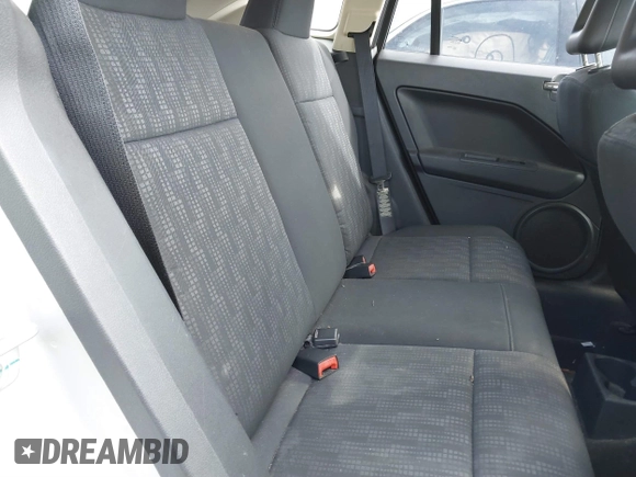 2008 Dodge Caliber SE with VIN 1B3HB28B48D502983, listed as a IAAI auction lot 41429571 with 185,487 mi miles and . Bid and sale history available at DreamBid. Image 8.