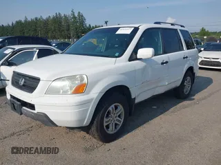 2005 Honda Pilot EX-L z VIN 2HKYF18515H524324, wystawiony jako IAAI lot #42572377 z przebiegiem 248 899 mil mil oraz . Historia ofert i sprzedaży dostępna na DreamBid. Obrazek 2.