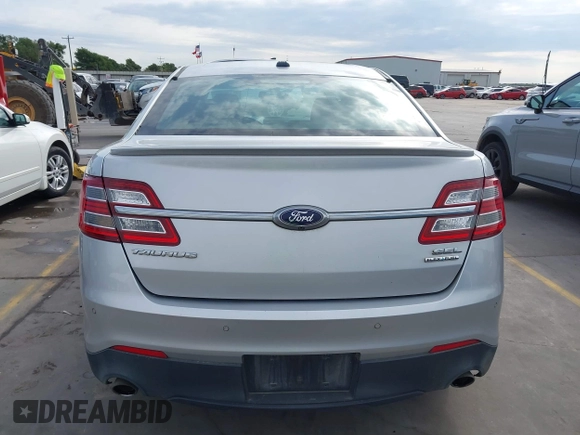 2015 Ford Taurus SEL z VIN 1FAHP2E88FG133328, wystawiony jako IAAI lot #42179649 z przebiegiem 127 171 mil mil oraz . Historia ofert i sprzedaży dostępna na DreamBid. Obrazek 16.