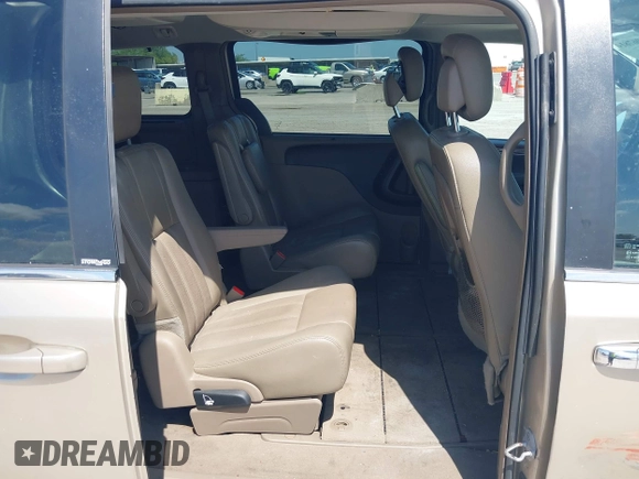 2013 Chrysler Town & Country Touring L with VIN 2C4RC1CG2DR767406, listed as a IAAI auction lot 42067814 with 75,985 mi miles and . Bid and sale history available at DreamBid. Image 8.
