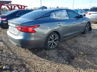 2016 Nissan Maxima Platinum with VIN 1N4AA6APXGC438961, listed as a IAAI auction lot 41535350 with 194,701 mi miles and . Bid and sale history available at DreamBid. Image 4.