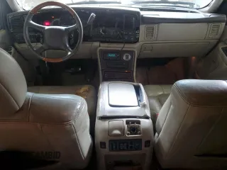 2002 Cadillac Escalade z VIN 1GYEC63T22R234266, wystawiony jako Copart lot #53041985 z przebiegiem 186 571 mil mil oraz Szkody całkowita. Historia ofert i sprzedaży dostępna na DreamBid. Obrazek 8.
