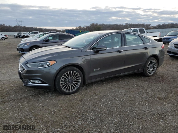 2017 Ford Fusion Energi SE with VIN 3FA6P0PU3HR354658, listed as a Copart auction lot 71824902 with 67,618 mi miles. Bid and sale history available at carsss.com. Image 1.