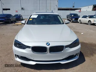 2012 BMW 3 Series 328i with VIN WBA3A5C51CF349987, listed as a IAAI auction lot 42013599 with 256,461 mi miles. Bid and sale history available at carsss.com. Image 12.