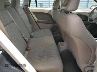 2008 Dodge Caliber SE z VIN 1B3HB28B18D776111, wystawiony jako Copart lot #58432035 z przebiegiem 106 065 mil mil oraz Szkoda całkowita • Salvage title. Historia ofert i sprzedaży dostępna na DreamBid. Obrazek 10.