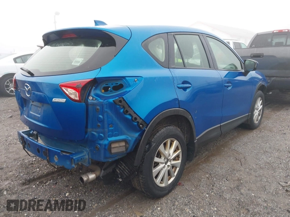2013 Mazda CX-5 Sport with VIN JM3KE4BE9D0157890, listed as a IAAI auction lot 40998406 with 134,087 mi miles. Bid and sale history available at carsss.com. Image 4.