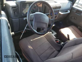 2003 Jeep Wrangler X with VIN 1J4FA39S03P317828, listed as a Copart auction lot 47012595 with 164,965 mi miles and Salvage Title. Bid and sale history available at carsss.com. Image 8.