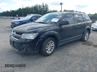2015 Dodge Journey SXT z VIN 3C4PDCBG5FT742257, wystawiony jako IAAI lot #42577447 z przebiegiem 128 816 mil mil oraz . Historia ofert i sprzedaży dostępna na DreamBid. Obrazek 2.