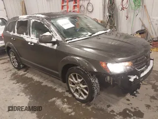 2016 Dodge Journey R/T with VIN 3C4PDCEGXGT212878, listed as a IAAI auction lot 41383369 with 227,652 mi miles and . Bid and sale history available at carsss.com. Image 1.