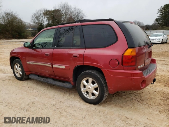 2004 GMC Envoy SLT with VIN 1GKDT13S342262833, listed as a Copart auction lot 87828975 with 203,404 mi miles and Salvage Title. Bid and sale history available at carsss.com. Image 2.