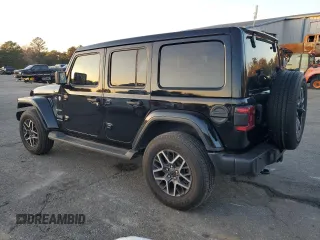 2024 Jeep Wrangler Sahara with VIN 1C4PJXENXRW118401, listed as a Copart auction lot 84731534 with 6,895 mi miles and Salvage Title. Bid and sale history available at DreamBid. Image 2.