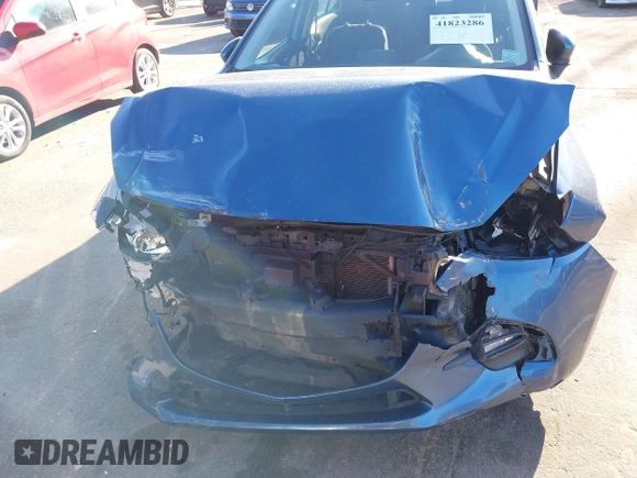 2017 Mazda 3 Touring with VIN 3MZBN1V74HM104034, listed as a IAAI auction lot 41823286 with 53,282 mi miles and . Bid and sale history available at DreamBid. Image 6.