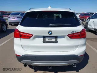 2017 BMW X1 xDrive28i with VIN WBXHT3C30H5F68187, listed as a IAAI auction lot 41830892 with 101,313 mi miles. Bid and sale history available at carsss.com. Image 16.